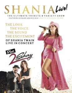 A poster of shania twain with two men and one woman.